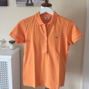 New Lacoste polo shirt in M